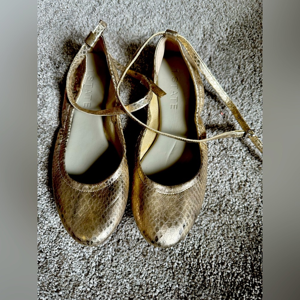 Gold ballet flats with ankle straps